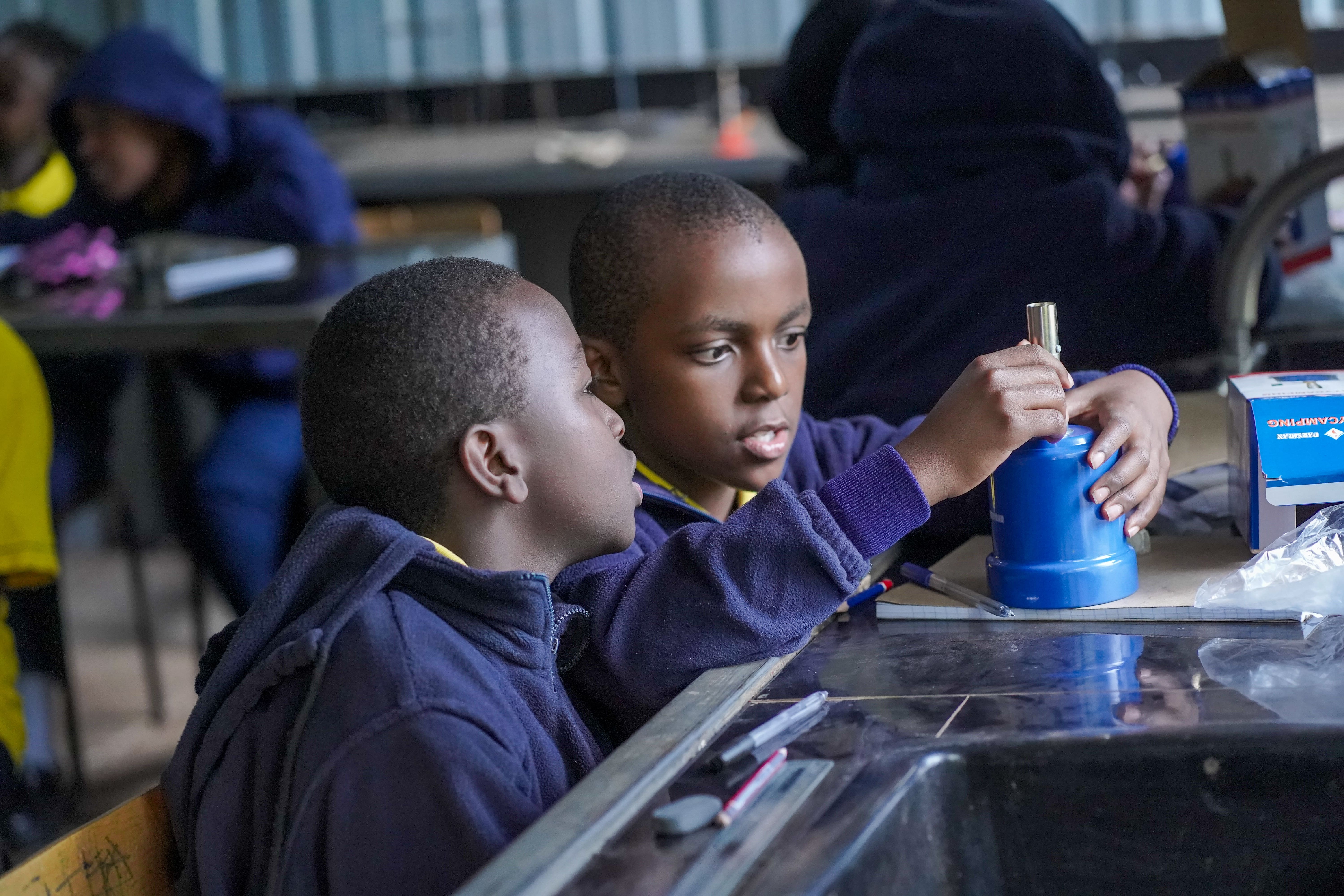 Havard School Grade 7 boys learning in the science lab